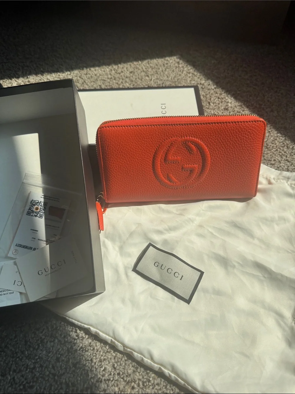 Gucci Orange Pebbled Leather Zip-Around Wallet With Tassle